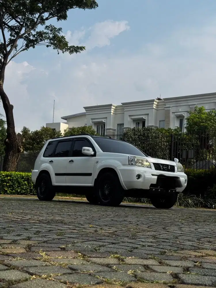 Xtrail t30 super white at 2006
