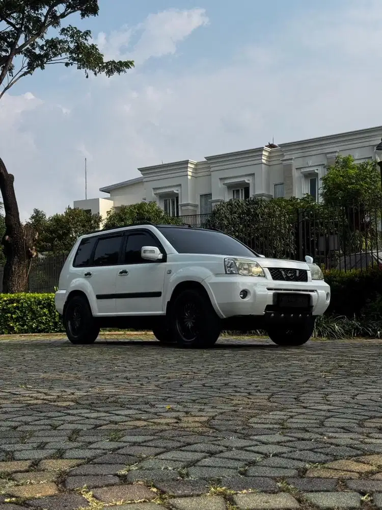 Xtrail t30 super white at 2006