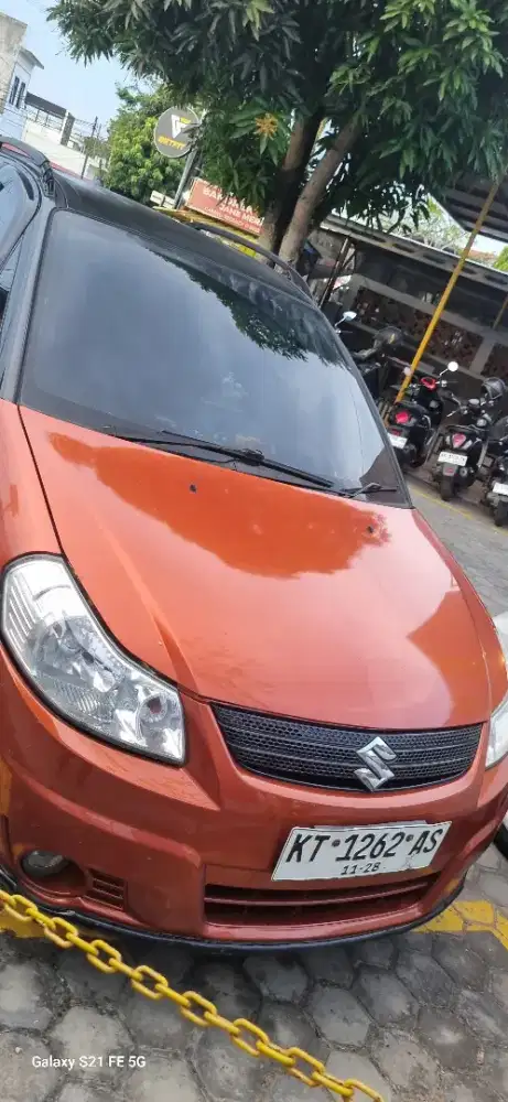 Djual suzuki exover manual tahun 2008