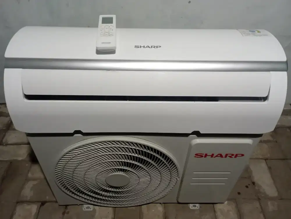 Ac Sharp 1/2Pk garansi 2 bulan