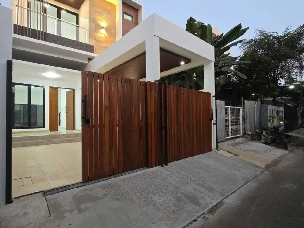 Rumah modern halaman luas siap huni dalam komplek duren sawit