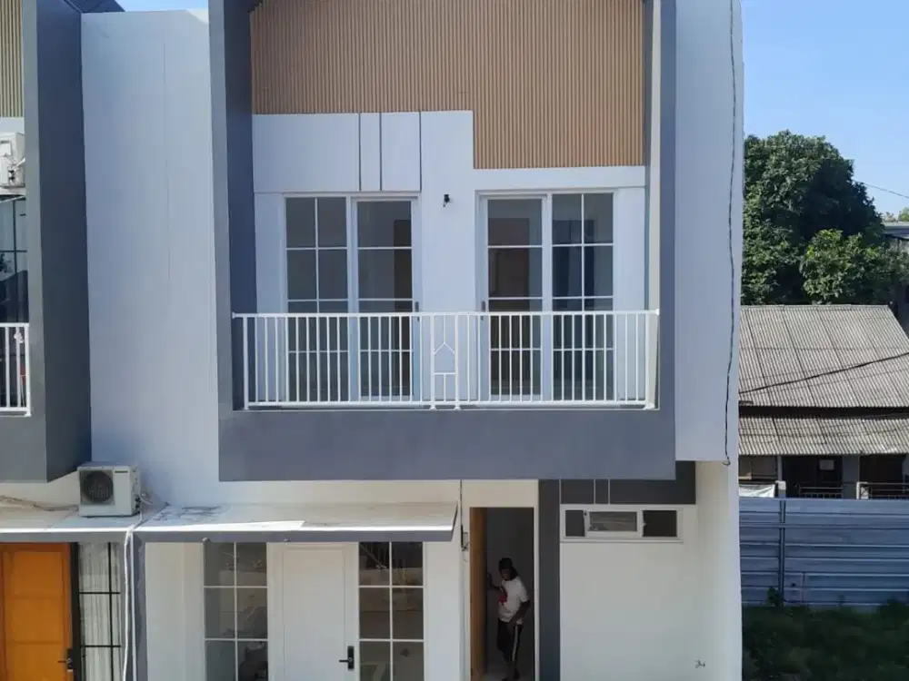rumah dalam cluster di jatikramat, bangunan kokoh full bata merah