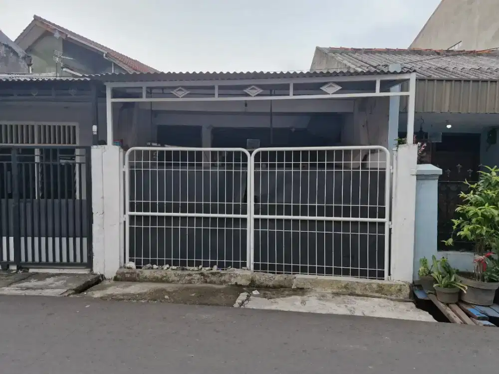 Rumah pinggir jalan daerah duren sawit ( harga nego)