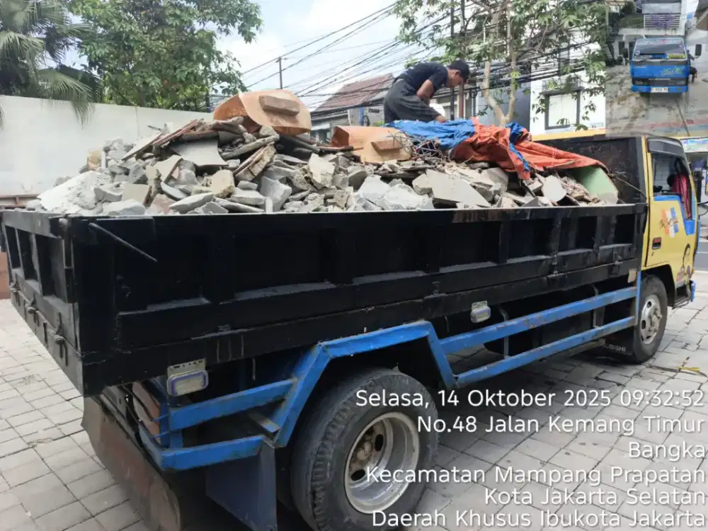 Jasa angkutan puing dan buang tanah