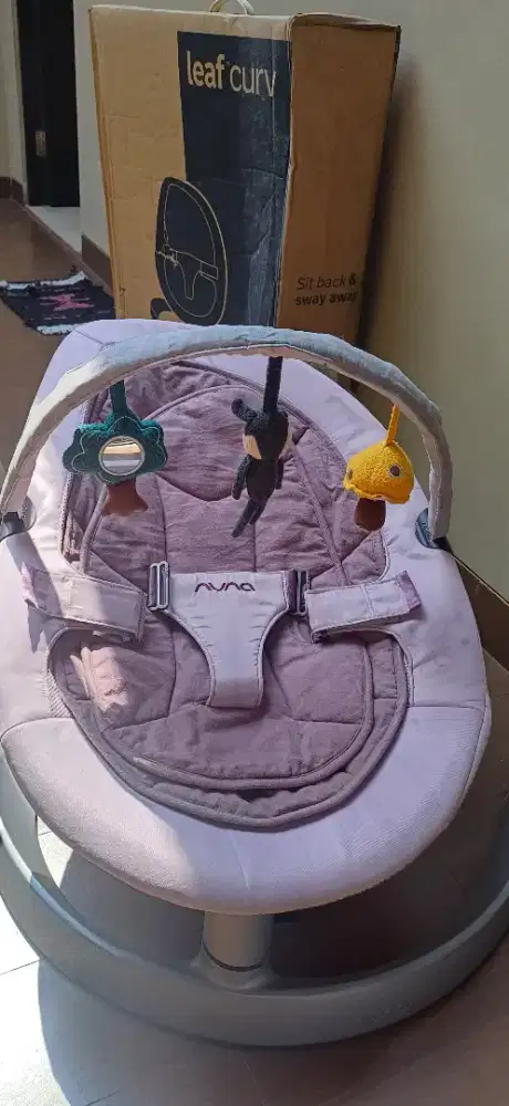 Preloved Nuna Curv Leaf with Toys