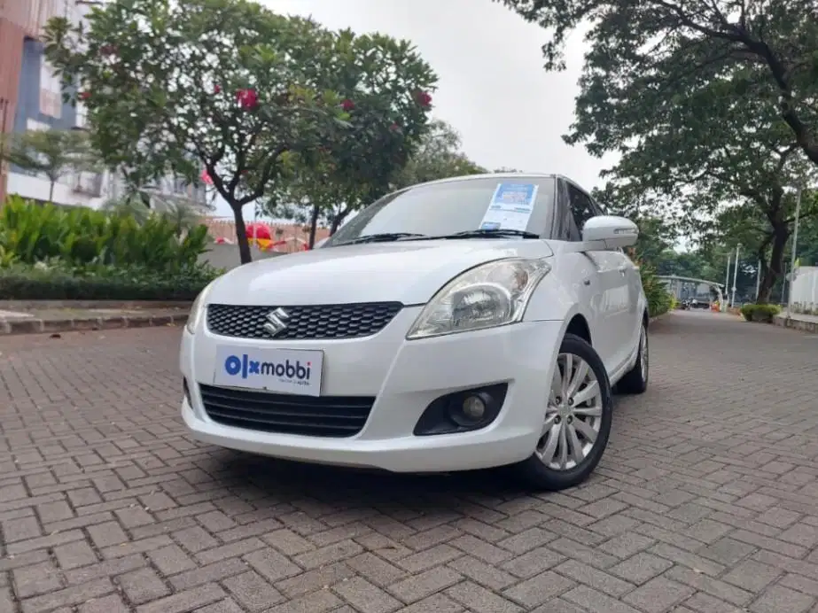 LOW DP Suzuki Swift 1.4 GX Bensin-MT 2013 TRE