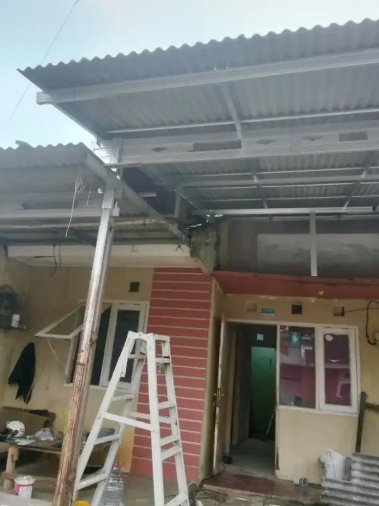 Tukang bangunan,atap baja ringan,kanopi,atap bocor,renopasi dll