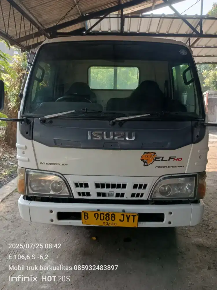 Isuzu Elf engkel long bak triway