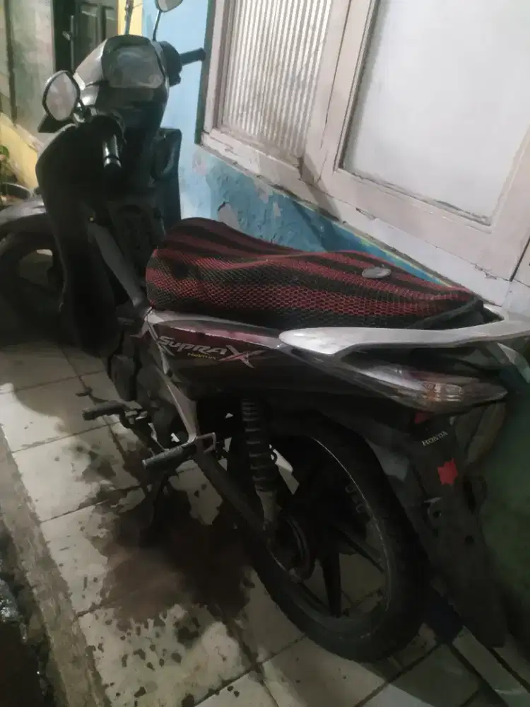 Motor Supra x helmin