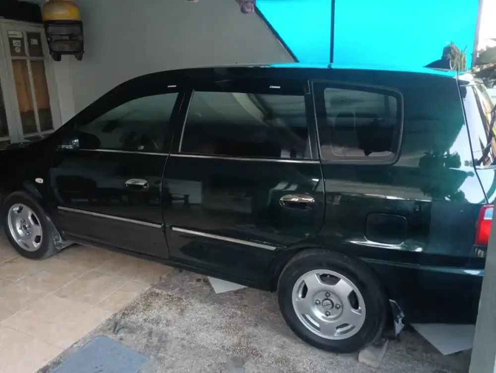 Kia caren 2 pajak hidup panjang