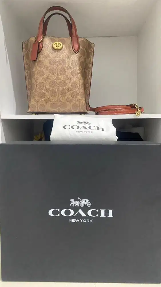 coach signature butik