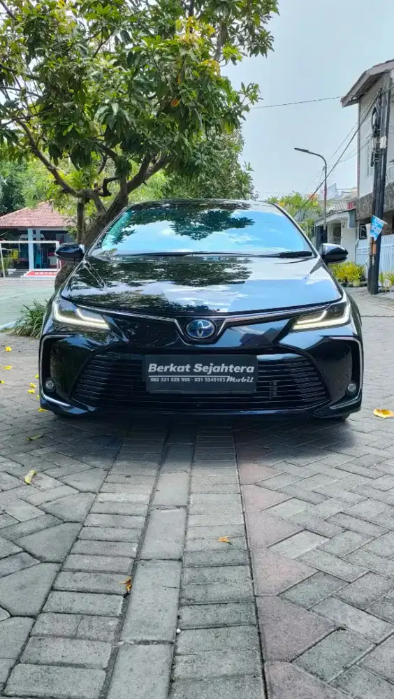 Km50rb corolla altis 1.8 hybrid hitam 2021 full orisinil surabaya
