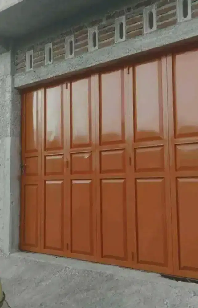 Pintu lipat trmpahan baru