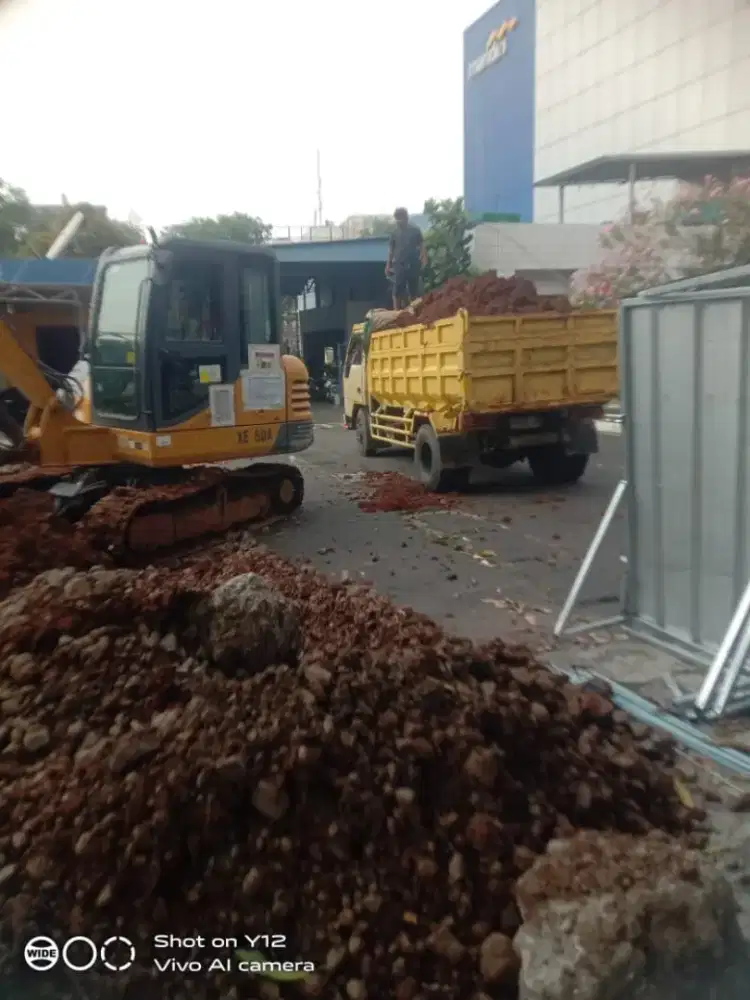 Jasa buang puing tanah dan pengurugan