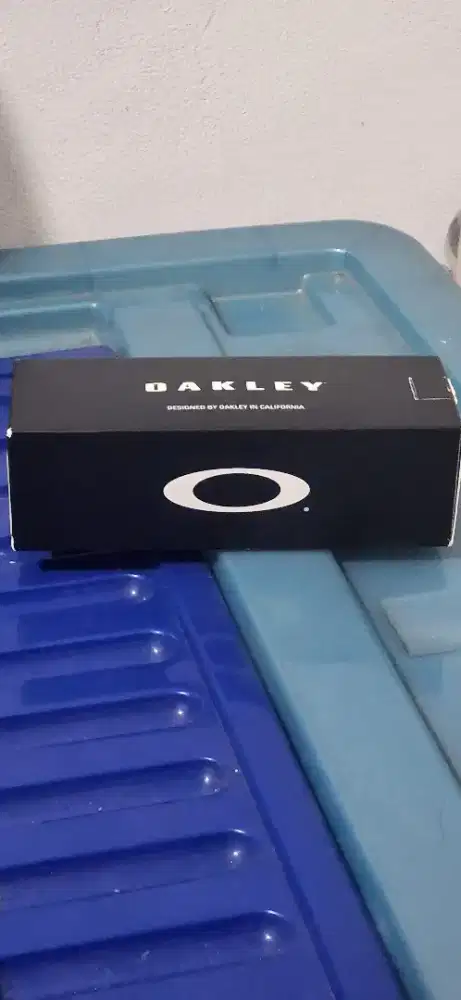 JUAL KACAMATA OAKLEY BIRU ORIGINAL OPTIK SEIS