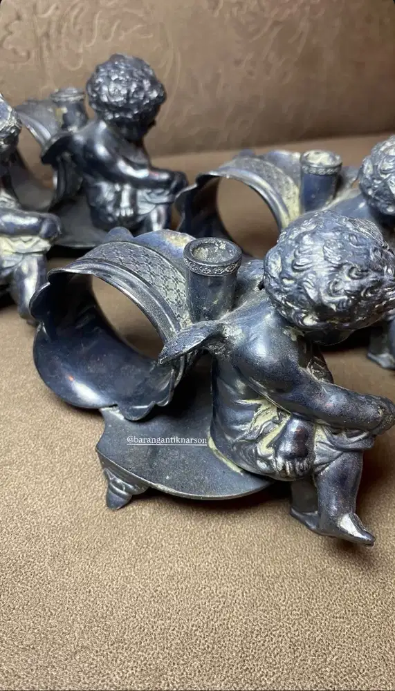 Patung perak QUADRUPLE PLATE