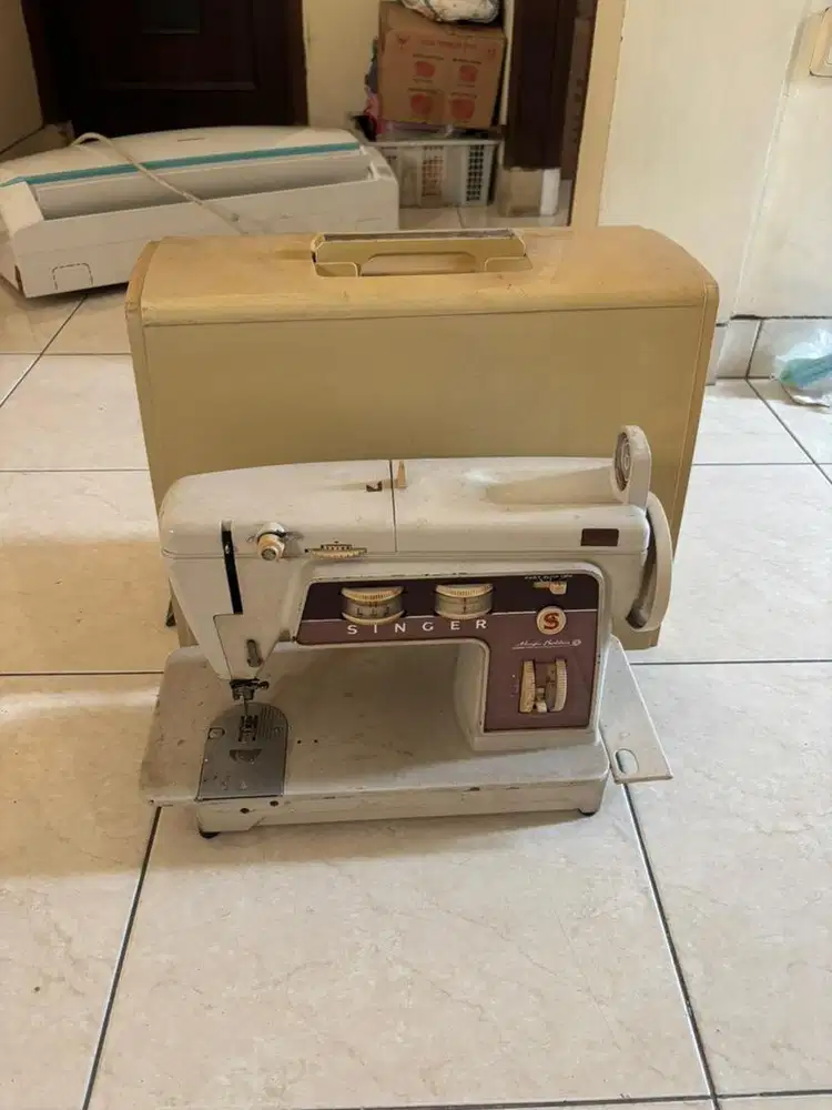 Mesin jahit vintage merk singer