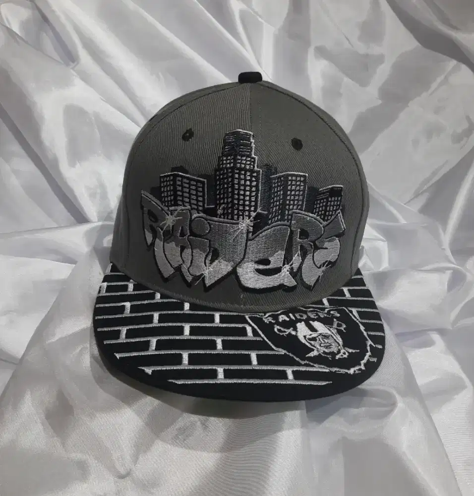 Topi raiders brand lokal LX