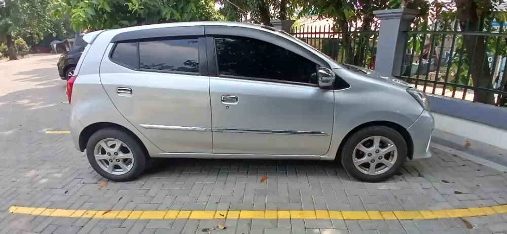 Toyota Agya G 2013 silver matic tangan pertama