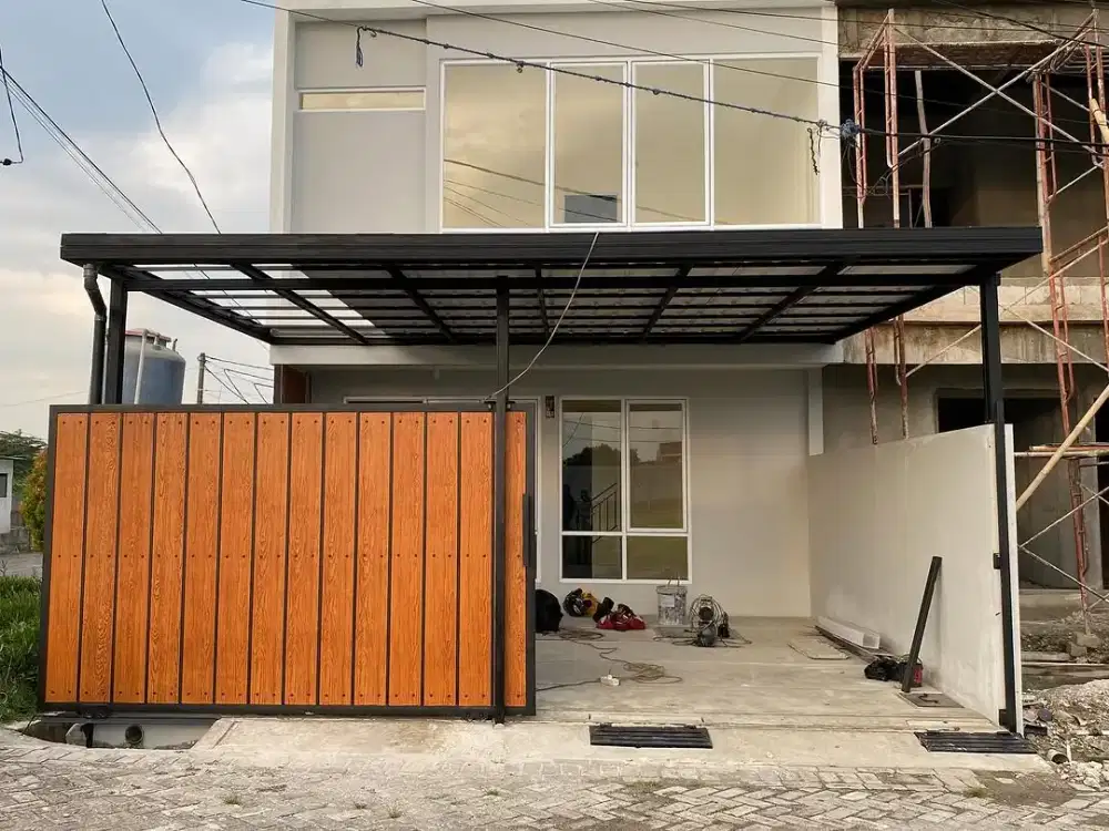 Kanopi rangka baja ringan terpasang rapi dan bersih