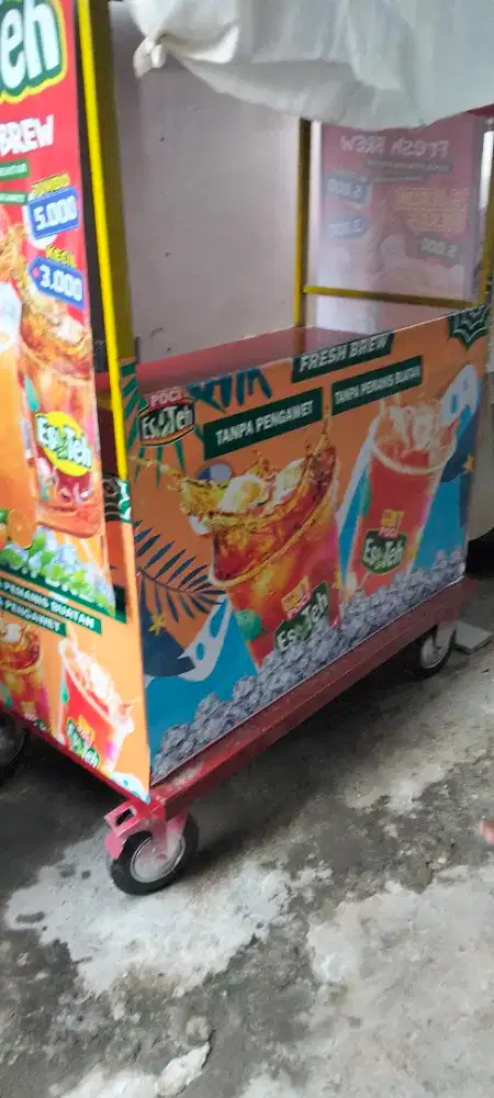 Gerobak es teh poci
