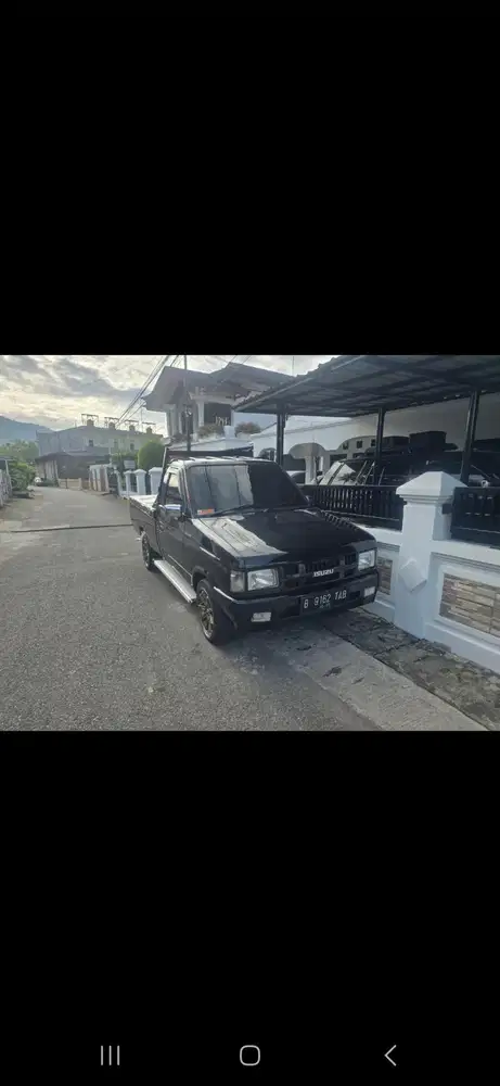 Isuzu Panther 2010 Bensin
