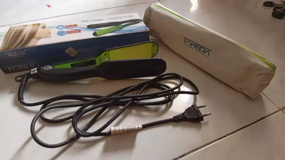 Catokan Rambut Takeda dan Johnny Andrean