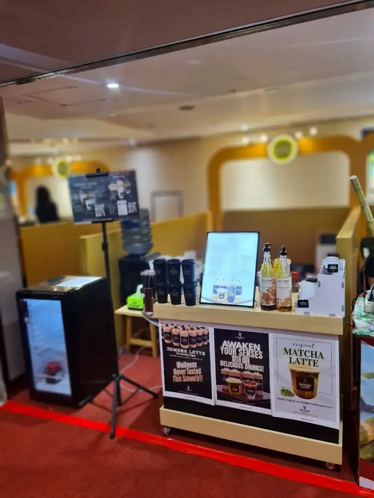 Penjaga stand minuman