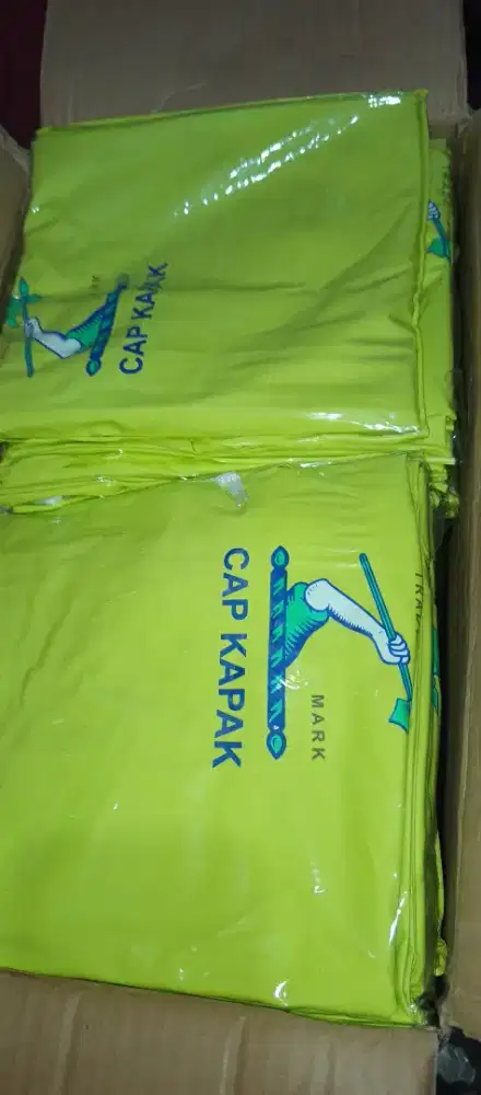 Jas hujan cap kapak model kelelawar