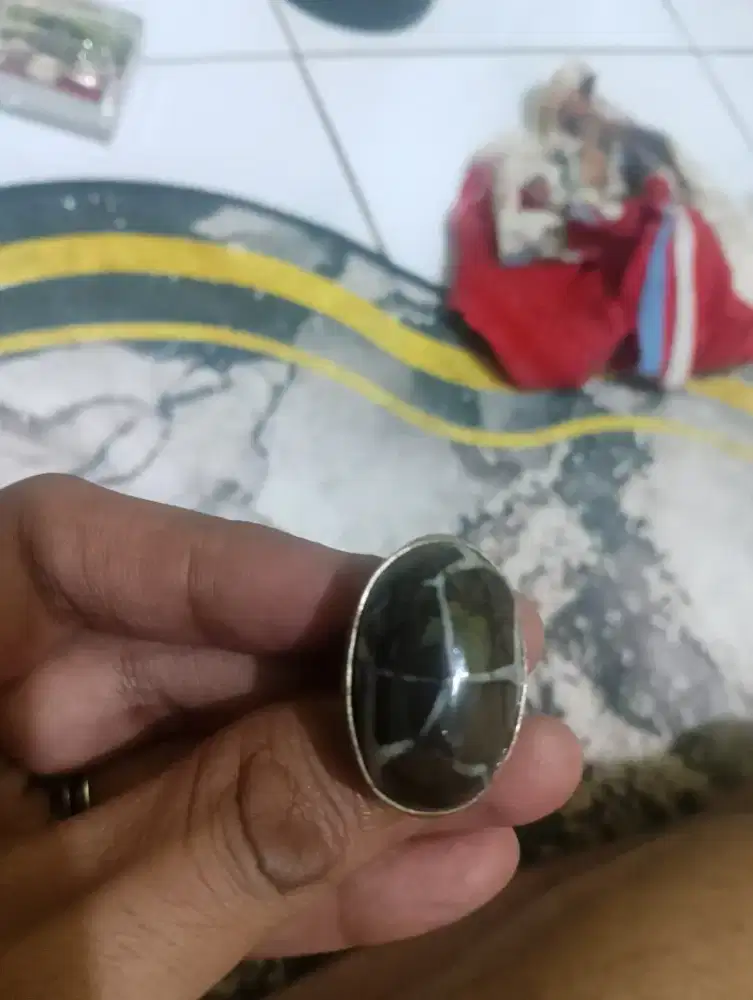 Cincin M jolosutra lawasan