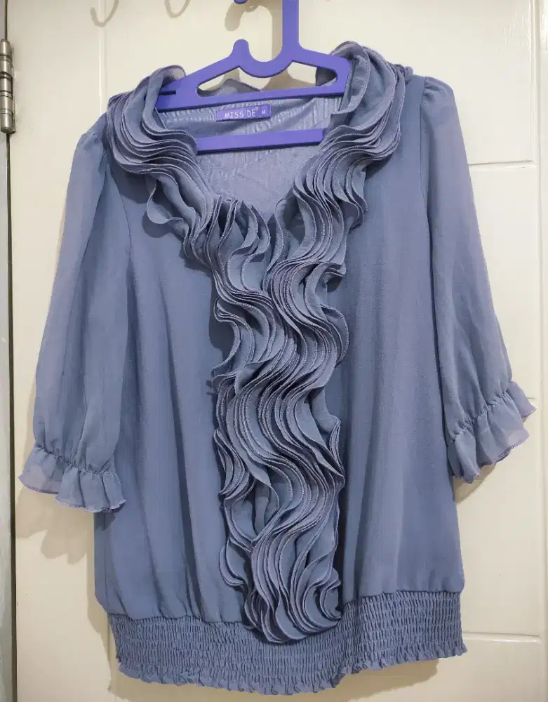 Atasan wanita model variasi spiral