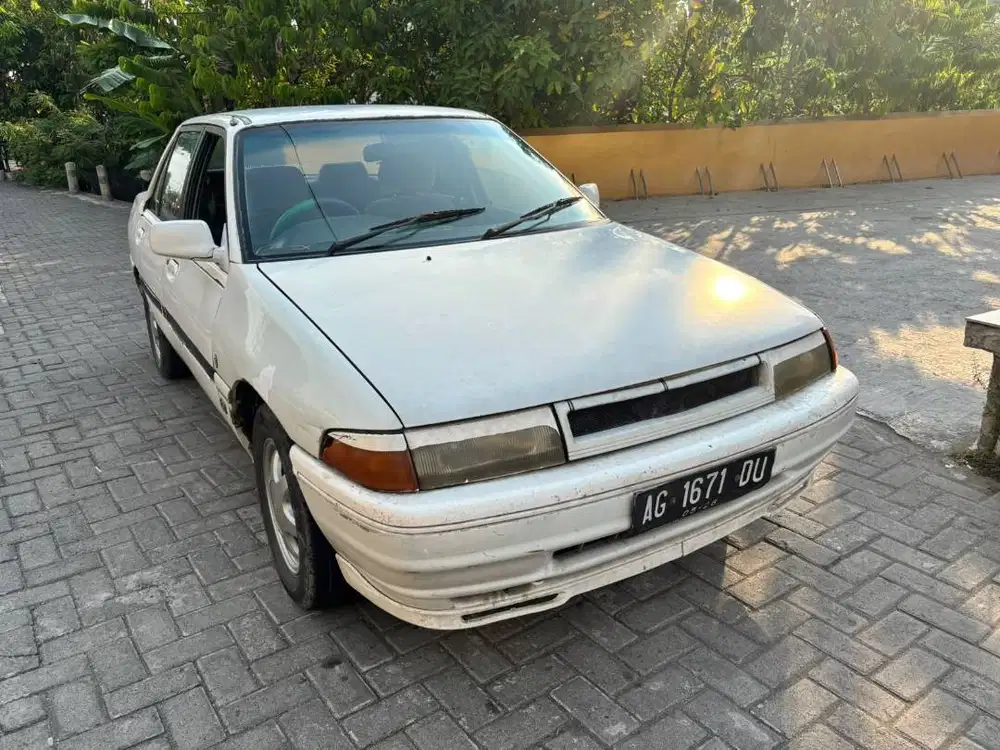 1991 Ford Laser 1.6 Plat AG off mif mobil bekas sekoto