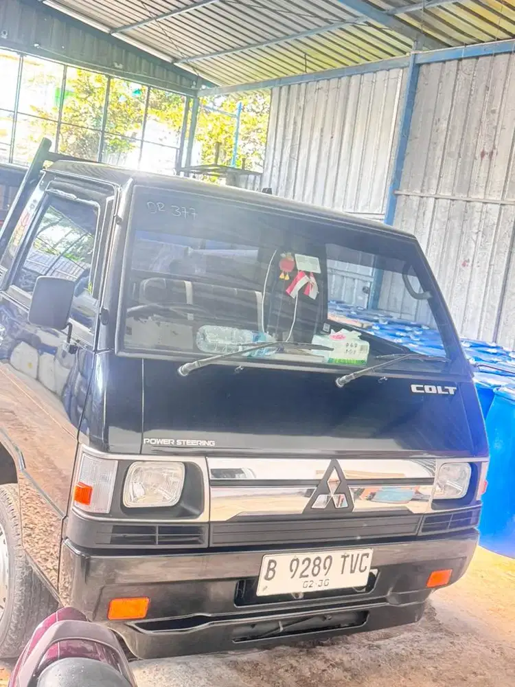 Mobil L300 baru 7 bln ( harga second mobil baru )