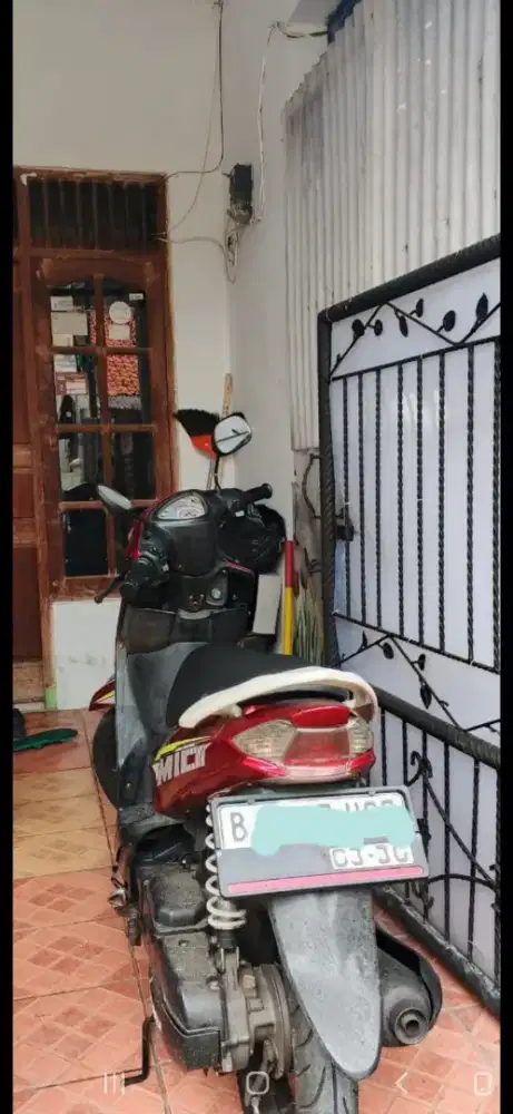 Mio smille merah