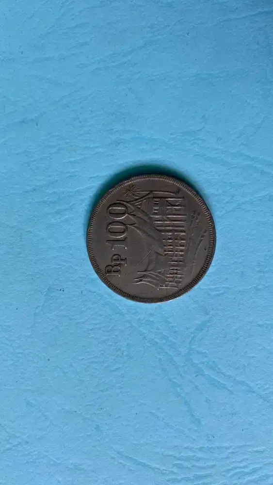 Uang kuno koin 100 perak