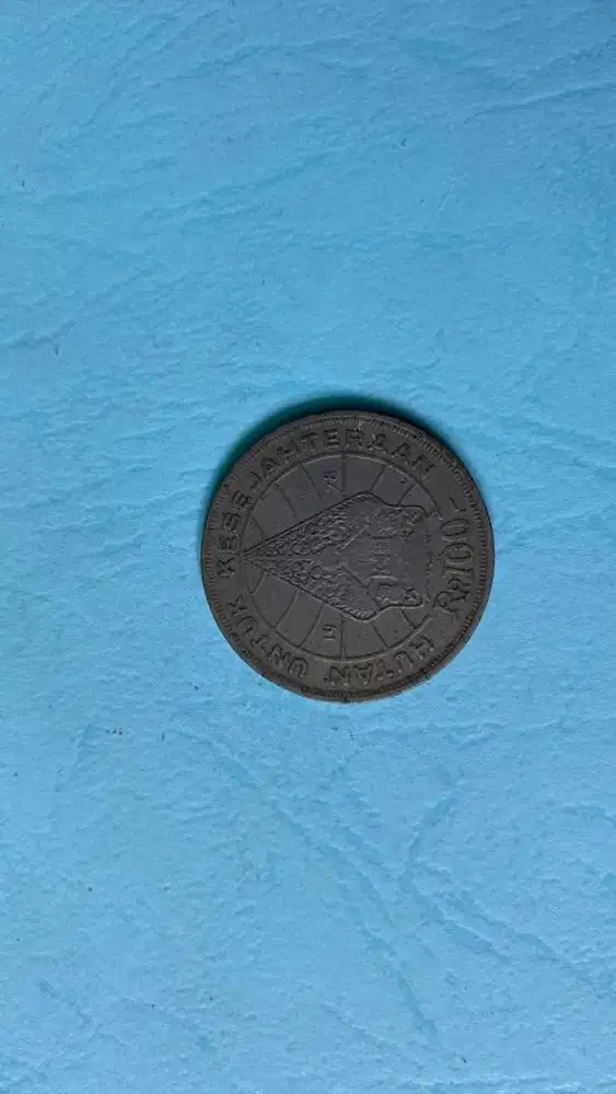 Uang kuno koin 100 perak