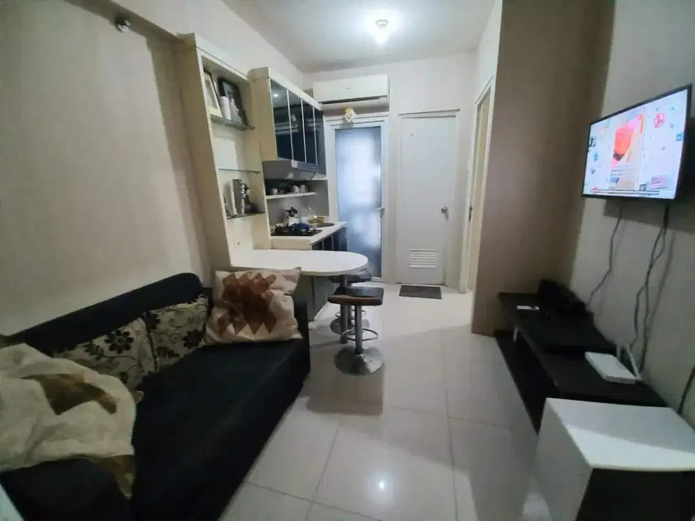 Disewakan apartment the green pramuka city 2kamar full furnish Bulanan
