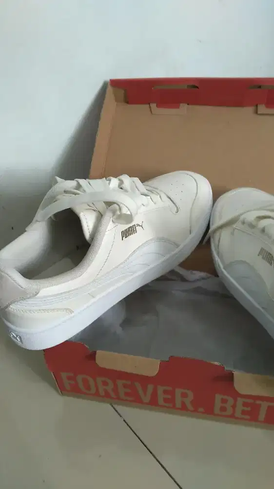 Sepatu merk puma