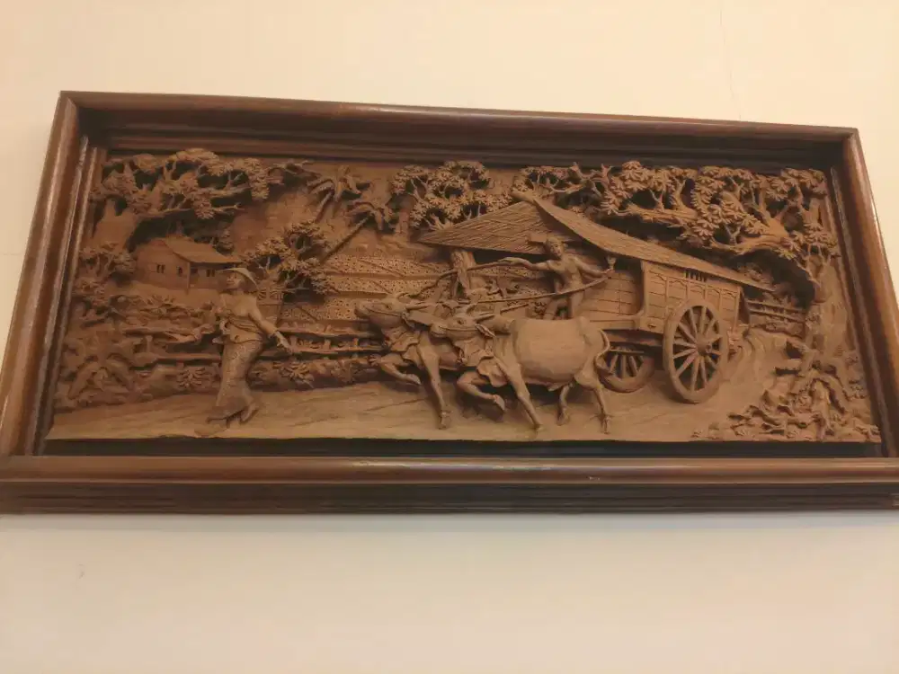 Pigura pahatan kayu