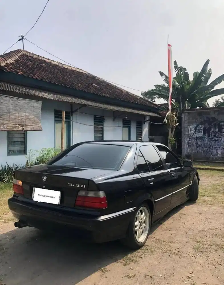 BMW 320i 1994 Bensin