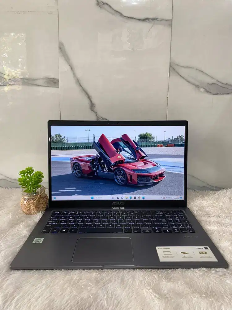 ASUS A516J 15 INCH	INTER CORE I3-1005G1 RAM 20 GB SSD 256 GB