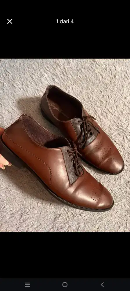 SEPATU YONGKI KOMALADI