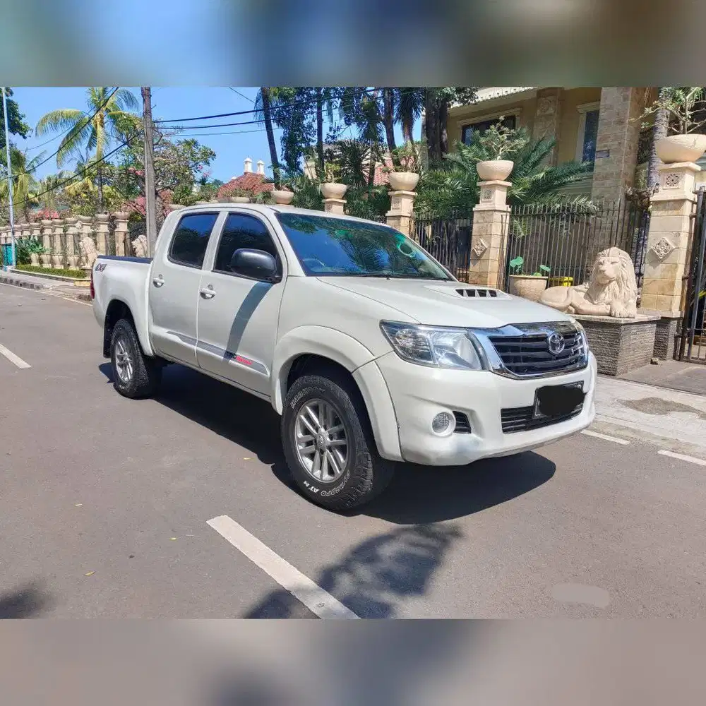 Hilux  E DC 4x4 2012 Solar  Putih  Terawat Siap Cari Uang
