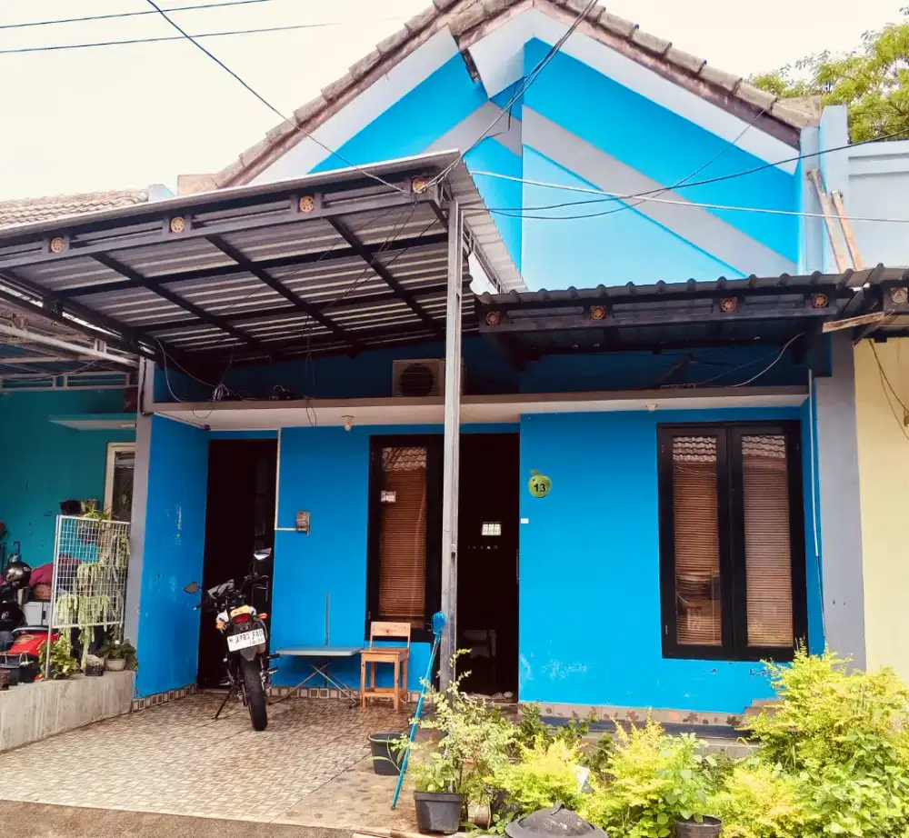 Rumah strategis dan asri