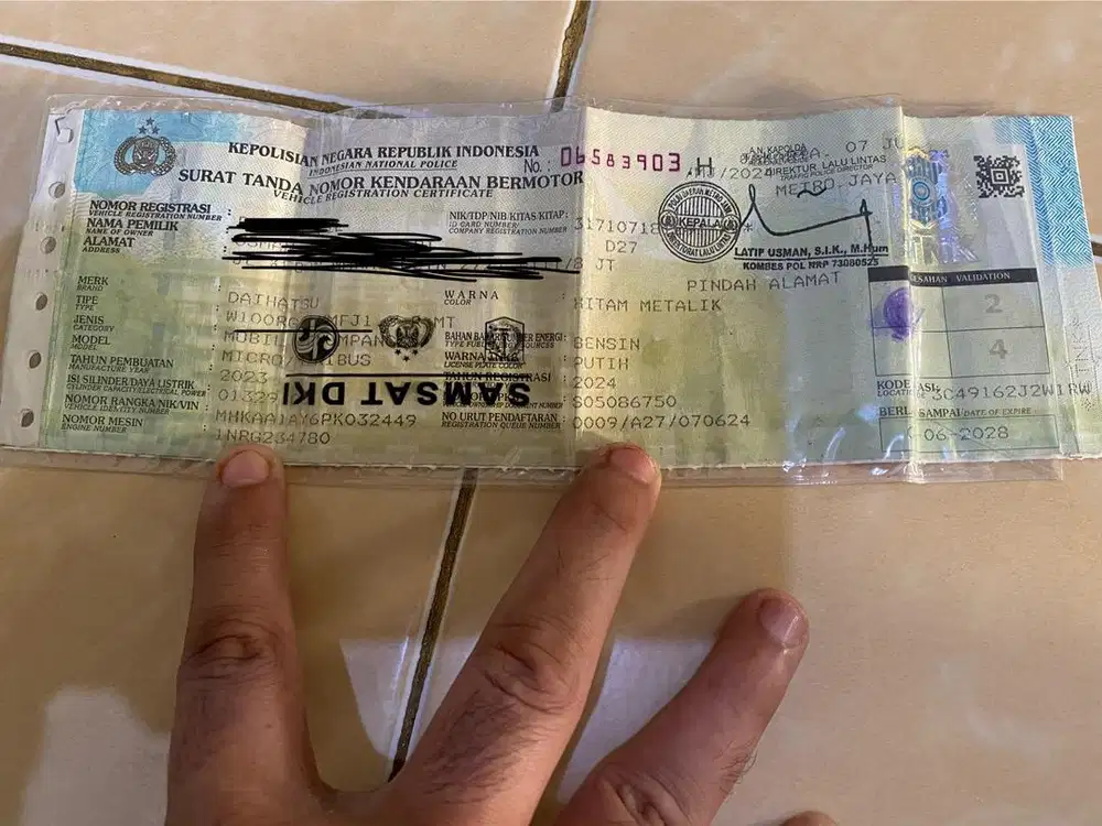 Mengurus pajak tahunan dan balik nama kendaraan