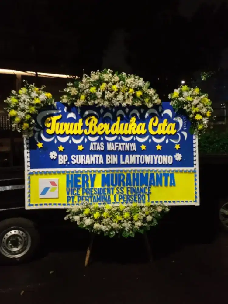 Bunga papan ucapan duka cita