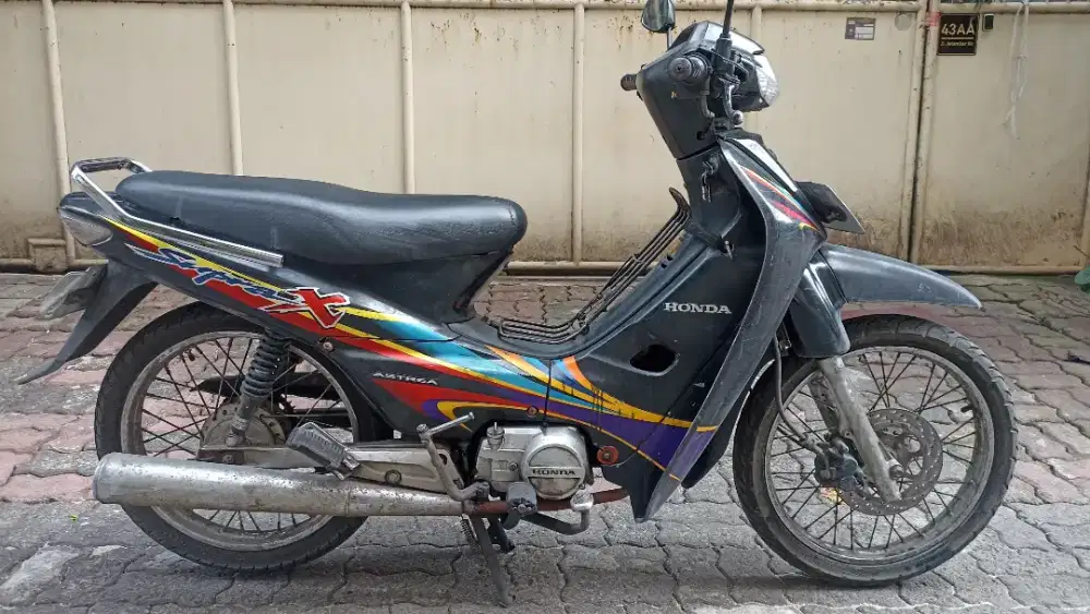 Honda Supra X tahun 2004.