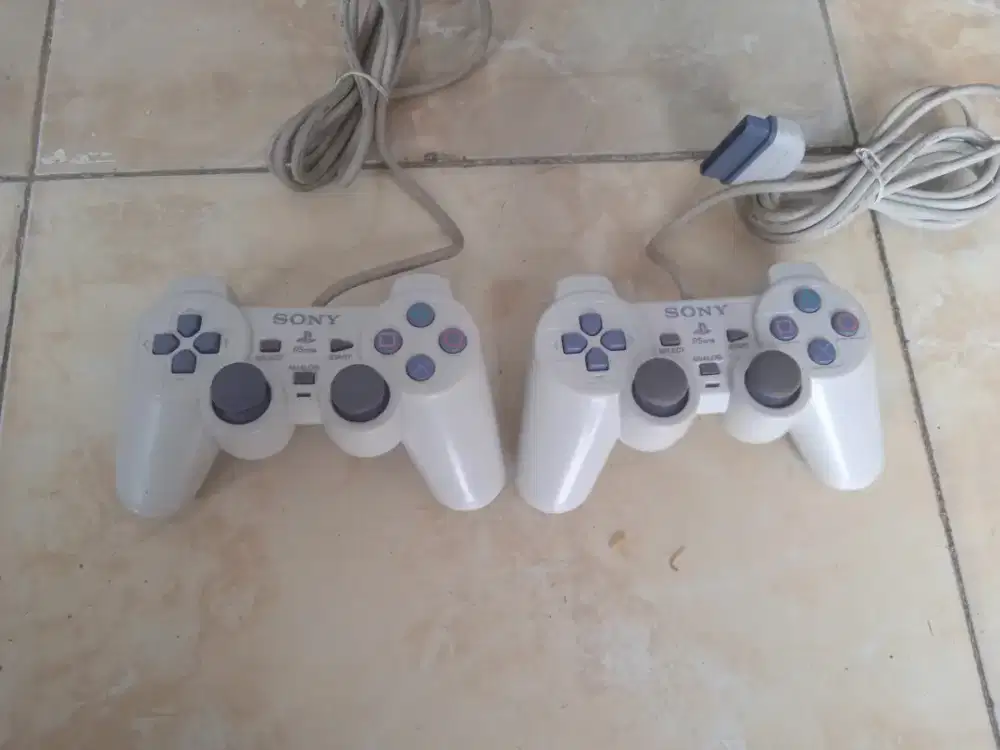 Stik PS one ori mesin baru segel putih gading normal poris cupondoh