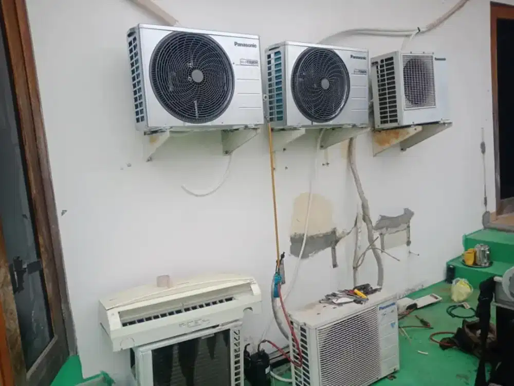 Service AC cuci AC bongkar pasang AC,isi freon AC