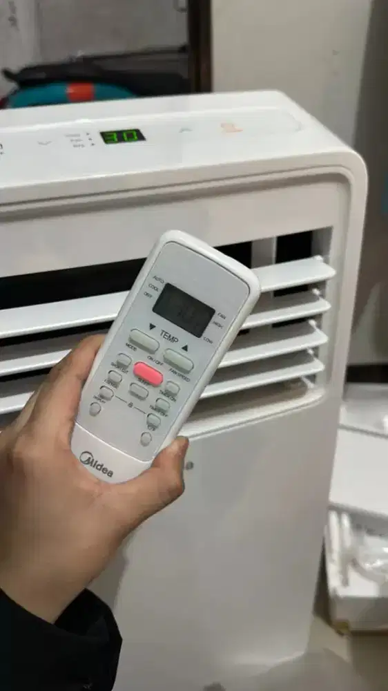 AC PORTABLE MIDEA 1/2 PK